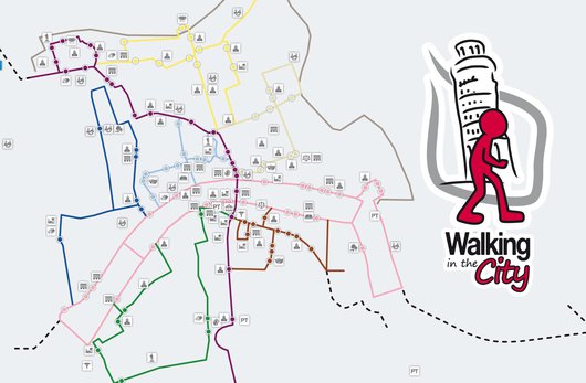 Il logo "Walking in the City" e il reticolo degli itinerari con i punti di interesse